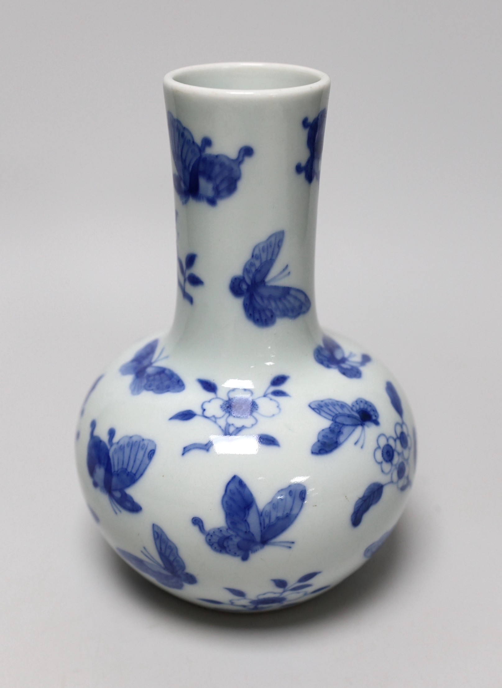 A Chinese blue and white ‘butterfly’ vase, 19cm